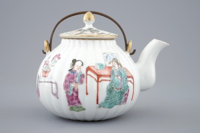 A Chinese famille rose teapot and cover, 19th C.